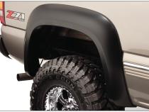 Black Extendafender Style Smooth Finish 4-Piece Fender Flare Set With Extended Coverage For 99-07 Silverado/Sierra Trucks (Check Application Guide) Bushwacker